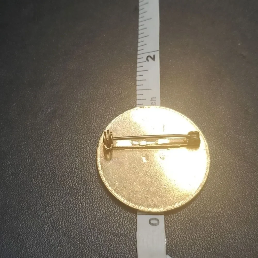 Gold tone H brooch round circular vintage